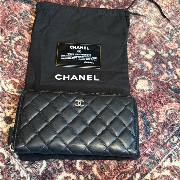 CHANEL Handbags - 🔥Authentic CHANEL Black Quilted Leather Wallet